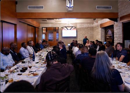 Cybersecurity leaders in conversation at a Cyber In Color dinner